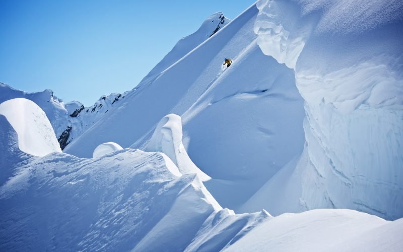 A skier descending a big-mountain line in Valdez, Alaska