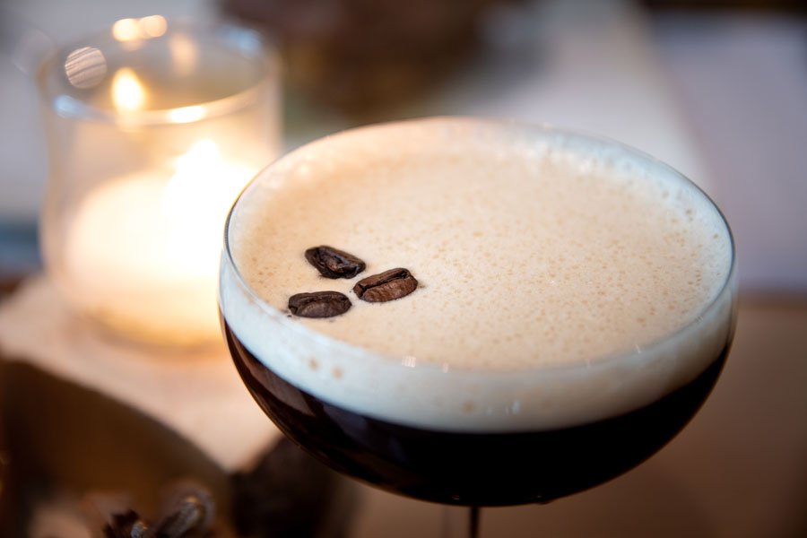 Espresso martini cocktail by candlelight at the Tsaina Lodge bar