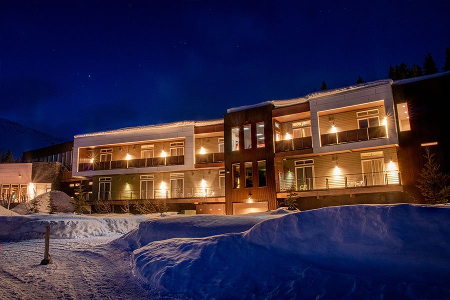 Exterior view of the Tsaina Lodge at night