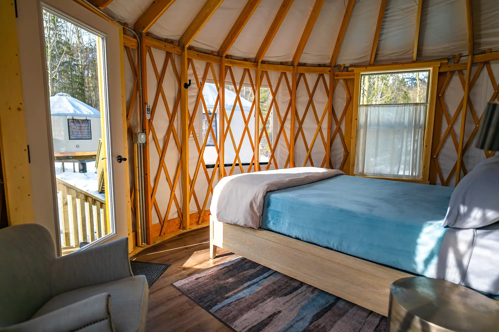 Bedroom inside a single yurt at the Alaska Rendezvous Lodge